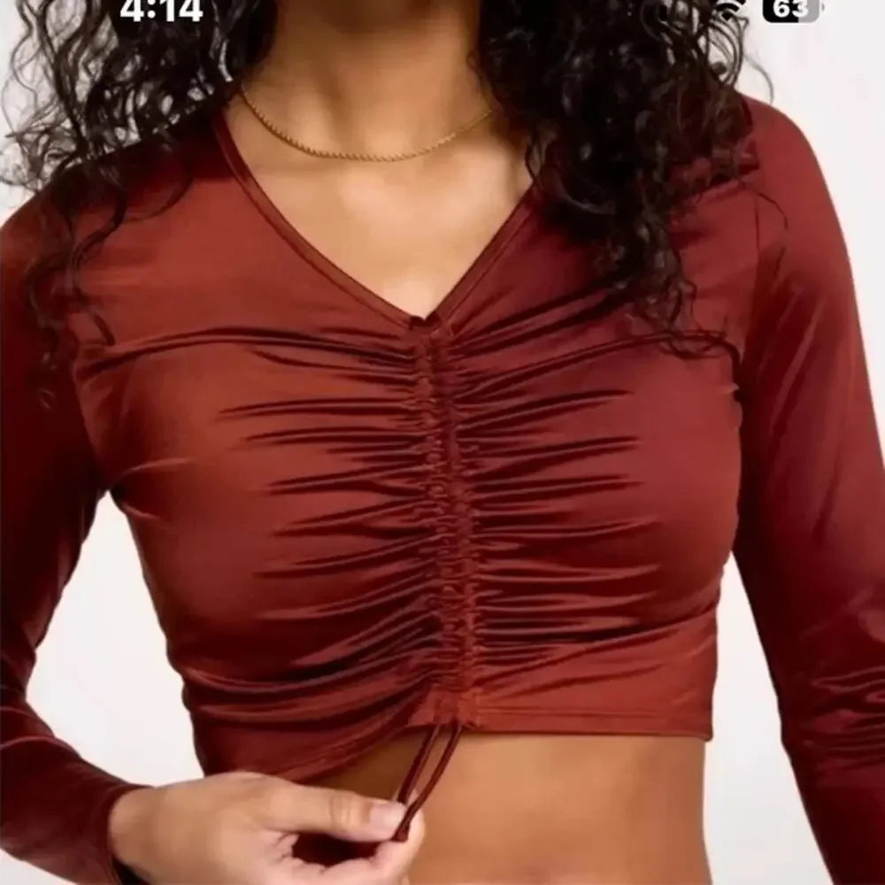 NWT/NWOT Calia long sleeve ruched swim rashguard in a red brown/copper color